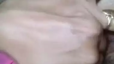 Desi bitch pulls pink dress up to XXX finger her wet hairy pussy