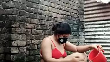 Shower scene of Bangladeshi village girl akhi looking beautiful with sexy dress. Teen hot girl is bathing in the bathroo