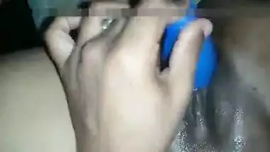 Hot Desi female shows off her smooth XXX pussy shoving a sex toy inside