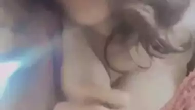 Nude Bhabhi presses boobs and fingers her pussy
