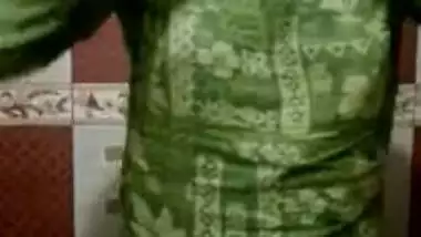 Green dress is thrown away and Desi sex model stay naked in XXX show