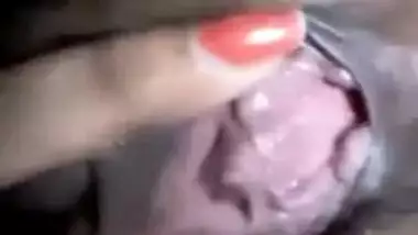 Young Indian chick perfectly combines listening to music with masturbation
