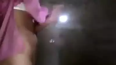 Slinky sex Indian woman takes her clothes off and flashes her XXX tits