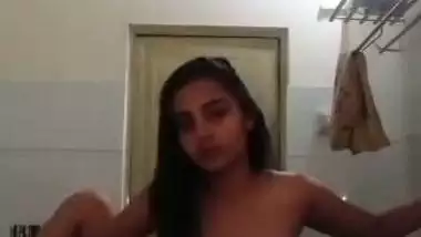 Indian nude MMS of an 18-year-old girl fingering in a bathroom