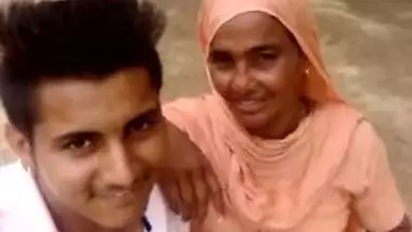 Boy and Desi MILF smile on camera thinking about upcoming porn video