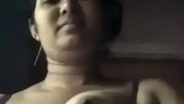 Village Bengali mom gets naked and rubs Desi XXX twat for the camera