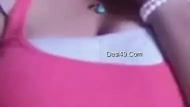 Woman from India acts like a webcam model when she has nothing to do