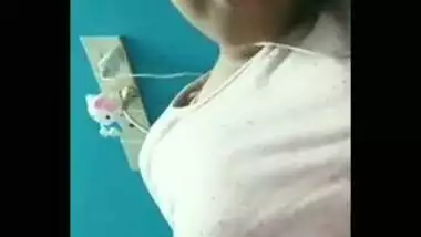 Indian girl listens to the music and exposes XXX tits on camera