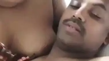 Chubby wife soft boobs pressed against husband in foreplay