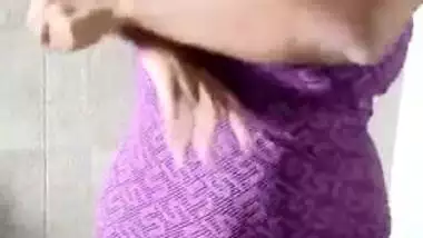 Desi slut takes off swimsuit to show her XXX tits in the mirror
