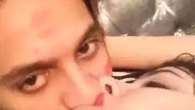 Sexy blue film of a horny young couple having fun in a hotel room