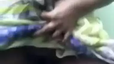 Desi chick in a colorful sari exposes tits and rubs XXX nipples