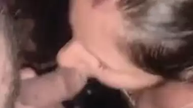 Indian XXX girl in polka-dot bra gives a blowjob to Desi man on camera