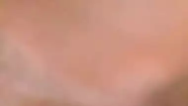 It is a close-up video of the Desi man filming wife's vagina